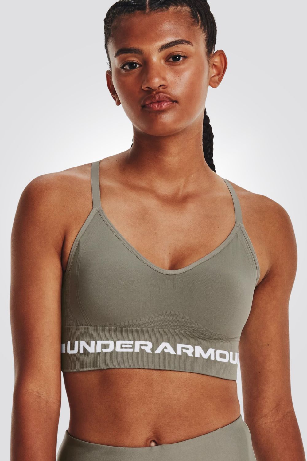 UNDER ARMOUR - טופ אימון לנשים בצבע אופוויט - MASHBIR//365