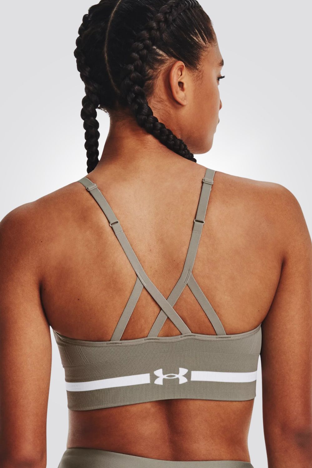 UNDER ARMOUR - טופ אימון לנשים בצבע אופוויט - MASHBIR//365