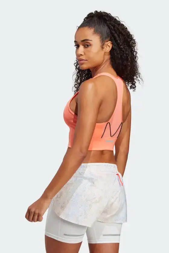 ADIDAS - טופ אימון לנשים RUN MS PKT בצבע אפרסק - MASHBIR//365