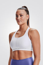 UNDER ARMOUR - טופ אימון Mid Crossback בצבע לבן - MASHBIR//365