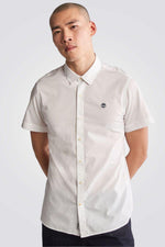 TIMBERLAND - חולצה מכופתרת קצרה עם לוגו בצבע לבן - MASHBIR//365