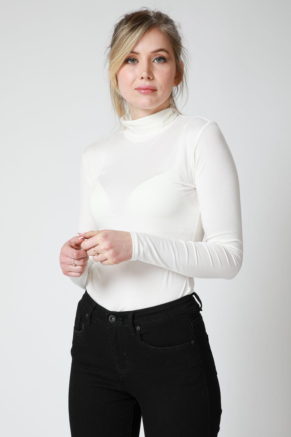 
חולצת גולף בצבע קרם | קנת קול