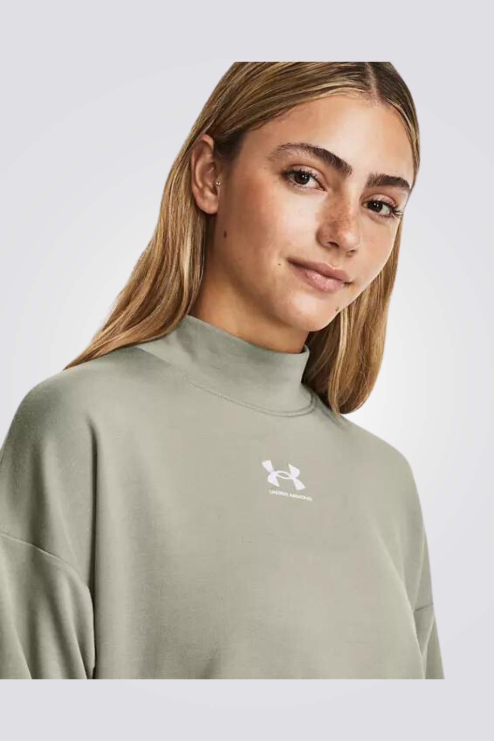 UNDER ARMOUR - חולצת ספורט ארוכה לנשים בצבע ירוק - MASHBIR//365